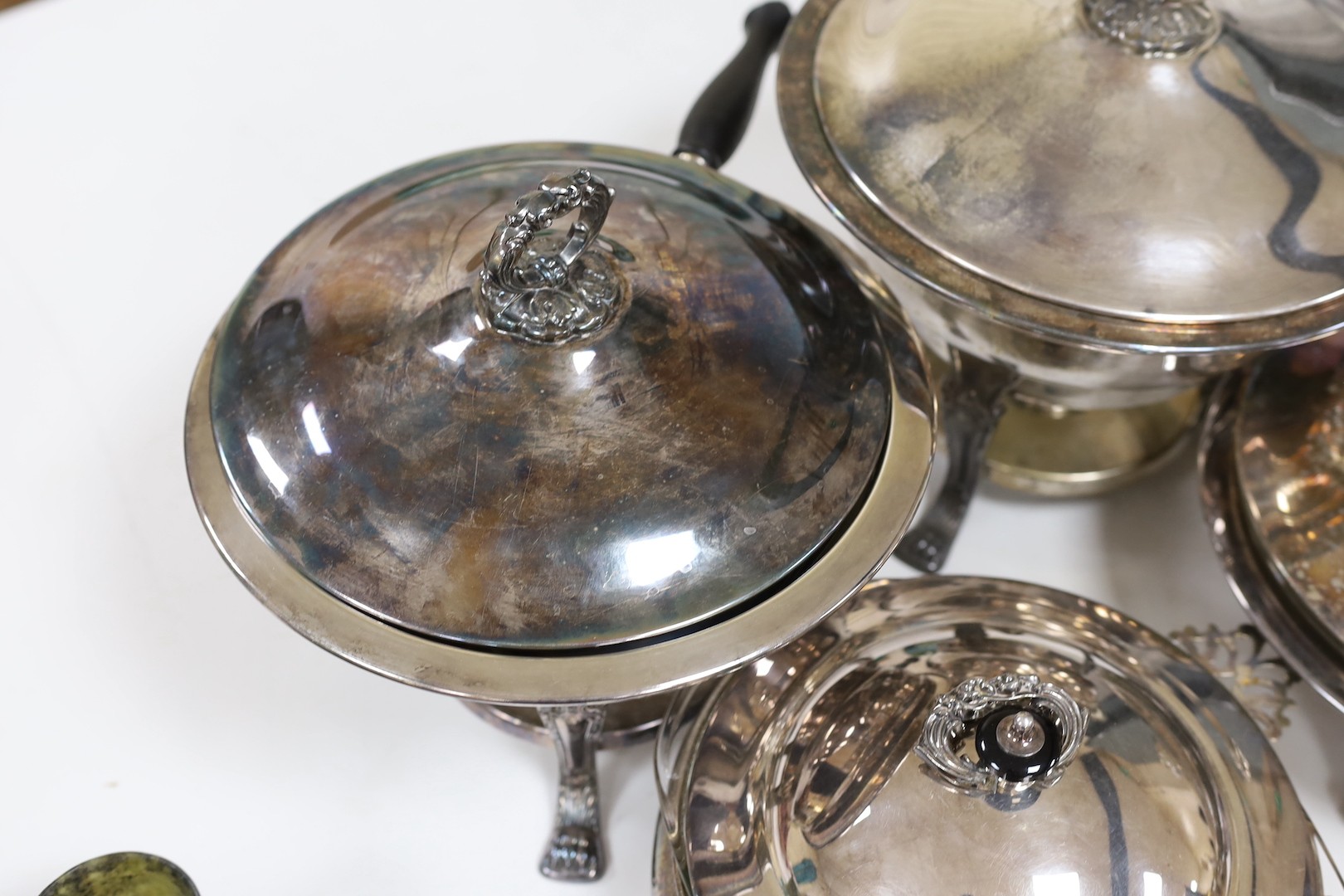 A pair of silver plated bain marie and two matching tureens with covers